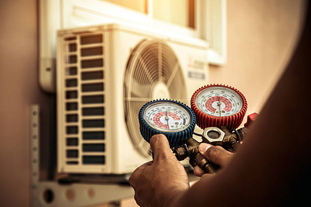 Professional Ac Installation technician working in Greenwood, MS
